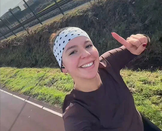 Shokz open-ear hardlopen veiligheid omgeving horen zonnetje solo run
